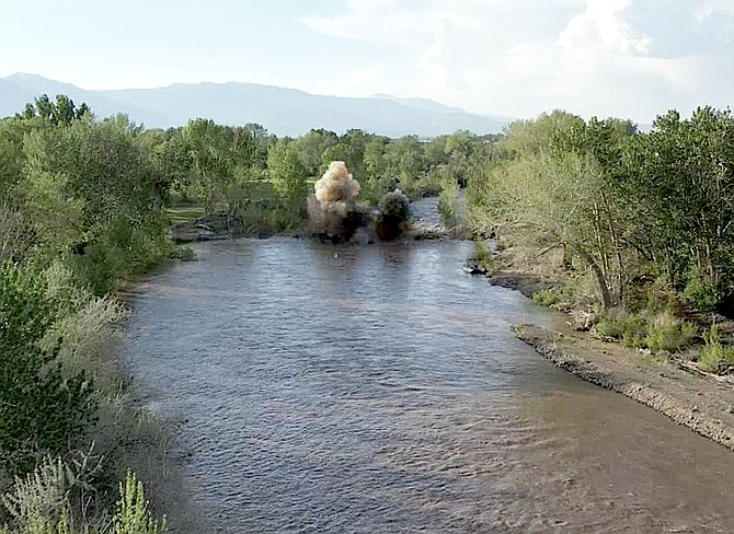 A screen shot from video of the demolition of a diversion dam on the East Fork near Carson Valley Golf Course on Friday taken by J.T. Humphrey