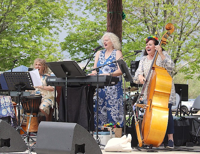 The Jazzettes perform in Heritage Park on Sunday afternoon in front of a good-sized crowd, despite thunder playing backup on bass during the Jazz & Art Festival in Gardnerville.