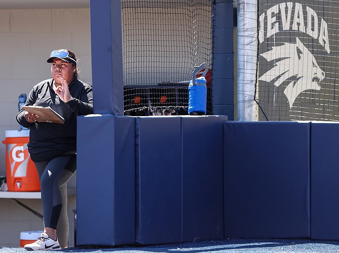 Douglas High School pitching coach Kali Sargent signals during the 5A state softball tournament over the weekend at Hixson Field in Reno. Sargent has been the Tigers’ pitching coach for the last two seasons, but has spent much more time than that with the Tiger hurlers.