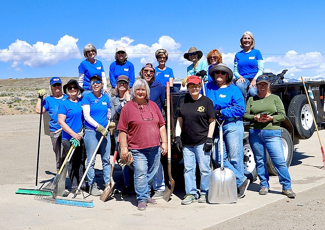 Members of the Douglas County Chapter of A Girl and A Gun at the Douglas County Shooting Range after working clean-up.