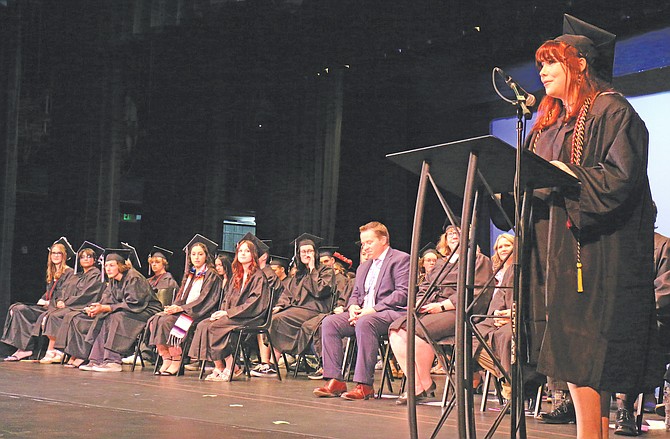 Graduate Faith Key, right, addresses Pioneer High’s Class of 2023 during commencement on May 31, 2023.