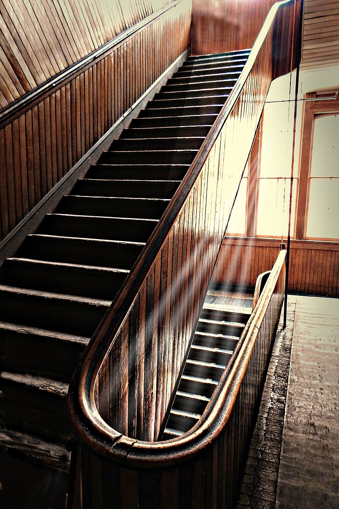 Connie Peters took first place with her photo titled “Morning Light on the School Stairs.”