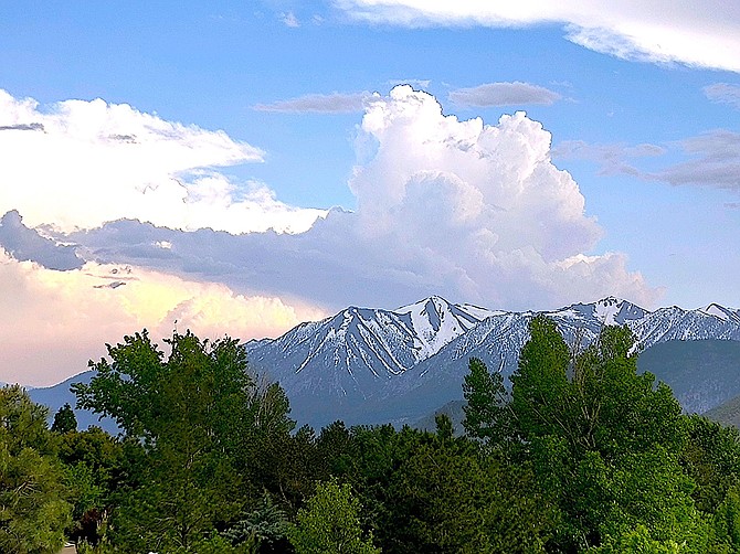 A thunderhead rises over Jobs Peak on Saturday. A flash flood warning was issued on Sunday afternoon for the Tamarack burn scar in Alpine County.
Photo special to The R-C by Ellie Waller