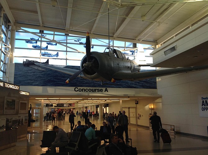 At Midway Airport in Chicago, where Concourses A, B & C intersect, this SBD-5 Dauntless Navy Dive Bomber is suspended for everyone to see the plane that sank all four Japanese fleet carriers at Midway, the beginning of the end for Warlords of Japan.