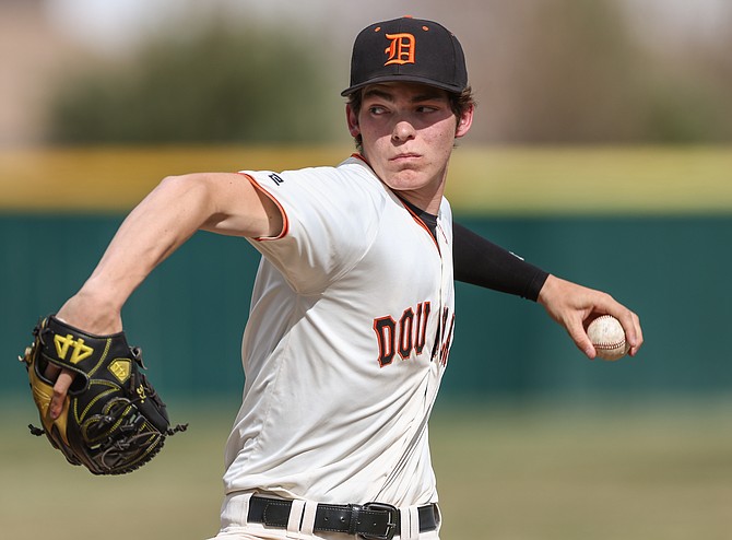 Douglas High’s Kaden McIver delivers a pitch earlier this spring. The Tigers’ lone senior was named as a Class 5A North first-team all-region selection for his performance on the mound.