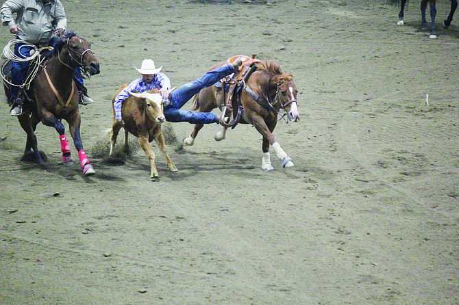 Humboldt County’s Billy DeLong competes in the steer wrestling at the Nevada State High School Finals in Winnemucca.