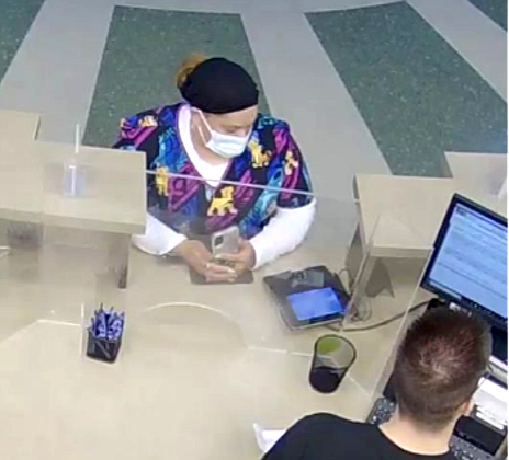 Photo from video surveillance of the suspect who used the victim’s bank accounts.