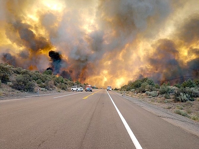 The Tamarack Fire burning across Highway 395 in 2021.