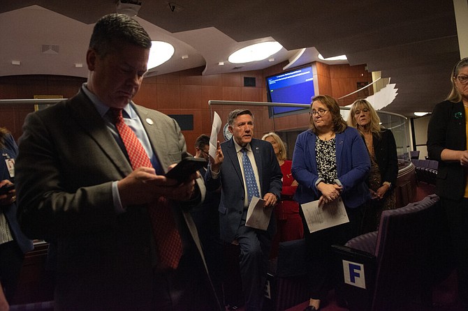 The Assembly Committee on Ways and Means meets behind the bar to introduce AB1 during the 34th special session of the Legislature in Carson City on June 6, 2023. (David Calvert/The Nevada Independent)