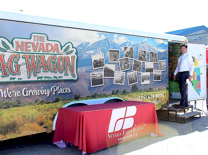 Minden Elementary School Principal Crespin Esquivel stands in the door of the Nevada Farm Bureau's Ag Wagon on May 30.