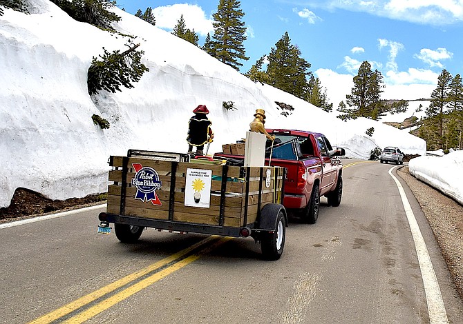 It didn't take long after Sonora Pass opened on Friday for Gardnerville resident Tim Berube to make his way up there. Still a lot of snow by the roadside up top.