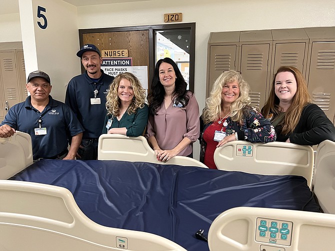Carson Tahoe Health has donated two hospital beds, valued at $15,000 each, to the Carson City School District. From left, Guillermo Hernandez, Yezmani Roque, Brittney Allen, Jennifer Brown, Sheila Story and Jenna Clark.