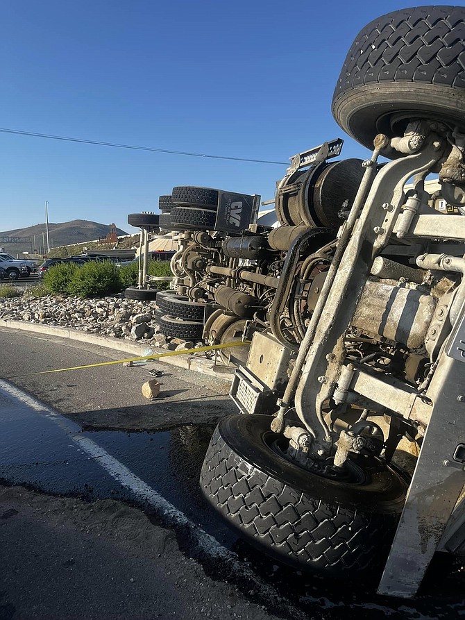 A concrete truck rolled over Tuesday morning on the northbound on-ramp for I-580 off Highway 50 in Carson City. Courtesy Carson City Fire Department.