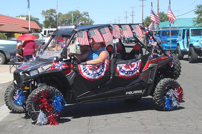 Downtown will buzz Tuesday beginning with the annual Fourth of July parade.