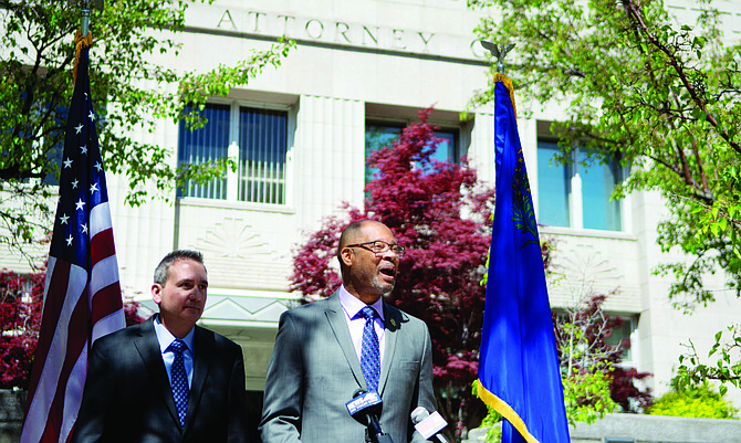 Attorney General Aaron Ford and Chief Deputy Attorney General Mark Kreuger during a press conference about an opioid settlement outside the Attorney General’s office in Carson City on Tuesday, May 16, 2023. (David Calvert/The Nevada Independent)