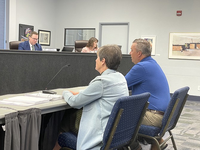 Community Development Director Hope Sullivan, left, and John Norman, vice president for the Save Mart company, at a hearing of the Liquor and Entertainment Board on Thursday.