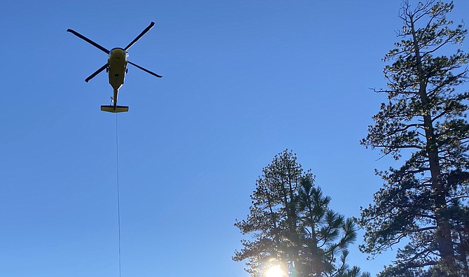 Helicopter operations for NVEnergy's Carson City to Glenbrook Transmission Line Project is underway on Spooner Summit near the junction of Highway 50 and 28. U.S. Forest Service photo