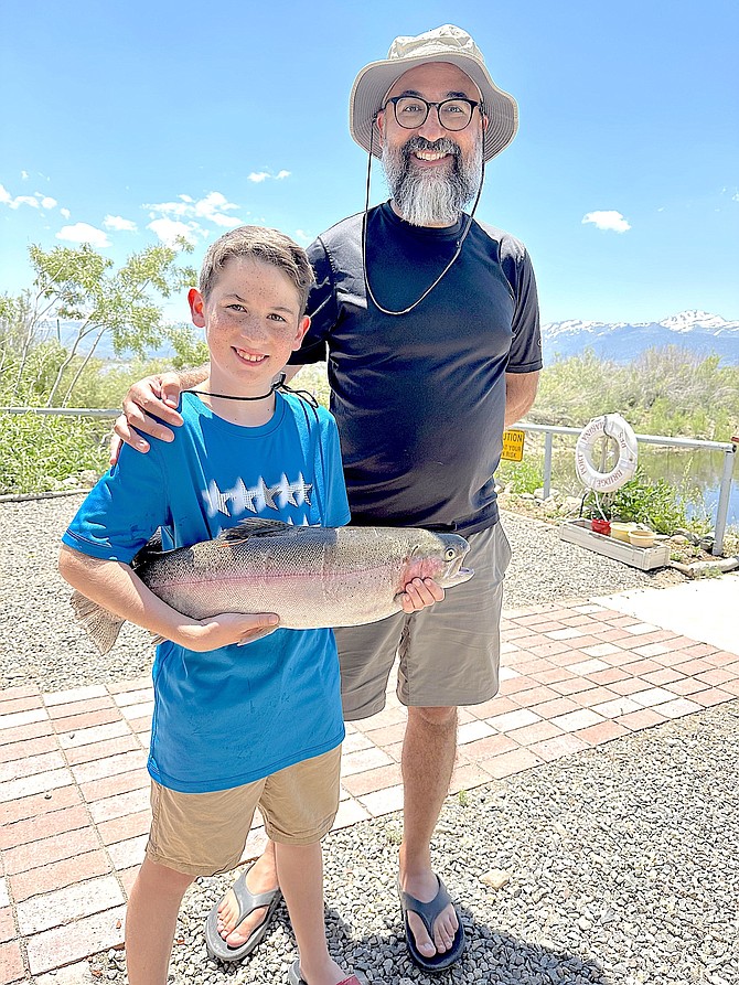 Mike and Holden Moghaddam with a 7.4-pound  rainbow caught at Bridgeport reservoir. Bridgeport Marina photo