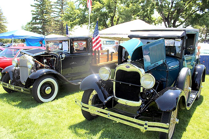 A couple of old-timers at the Send a Scout to Camp car show at Lampe Park on Saturday included a 1929 Ford Pickup owned by Howard Thew and a 1931 Ford Model A owned by Larry and Carolyn Baehr.