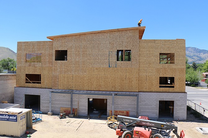 The three-story commercial building of FISH’s training center is being completed and will offer a parking lot along North Carson and North Fall streets for students.