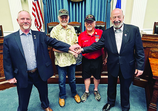 Nevada Department of Veterans Services Director Fred Wagar, right and Deputy Director of Benefits Evan Rush, left, pose with Veterans of the Month James Hanson, second from left, and William Grey. Hanson and Grey were recently honored as Veterans of the Month for July and August, respectively.