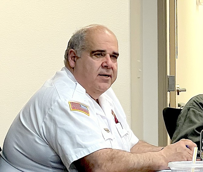 East Fork Chief Tod Carlini talks to the East Fork Fire Protection District Board of Trustees on April 18.