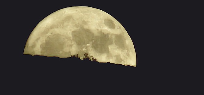 The July 3 super moon looks bigger as it is rising. Photo special to The R-C by Kelli Wilkerson