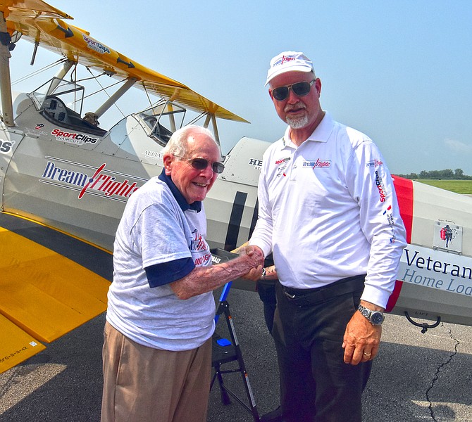 Dream Flights founder and aviator Darryl Fisher presented its 6,000th Dream Flight to 100-year-old Donald Muncy, a U.S. Navy veteran who served in World War II and the Korean War.