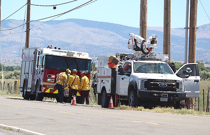 Firefighters and NVEnergy troubleshooters at the scene of another small fire and large power outage on Friday afternoon.