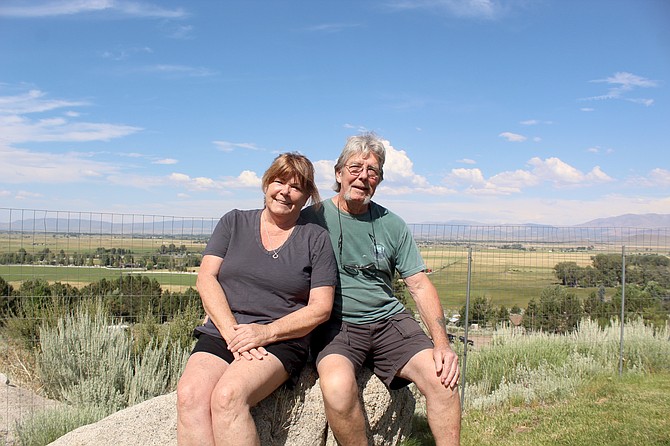 Casey and Larry Braun with the view from their home above Foothill Road on Wednesday afternoon. The couple is thanking all the people who helped them after their home was inundated on Aug. 4, 2022.