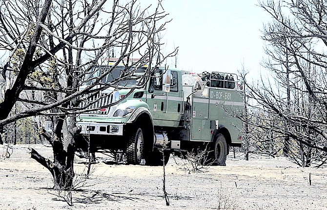 A U.S. Forest Service brush truck parked among what was left of the sagebrush after the Numbers Fire in July 2020.