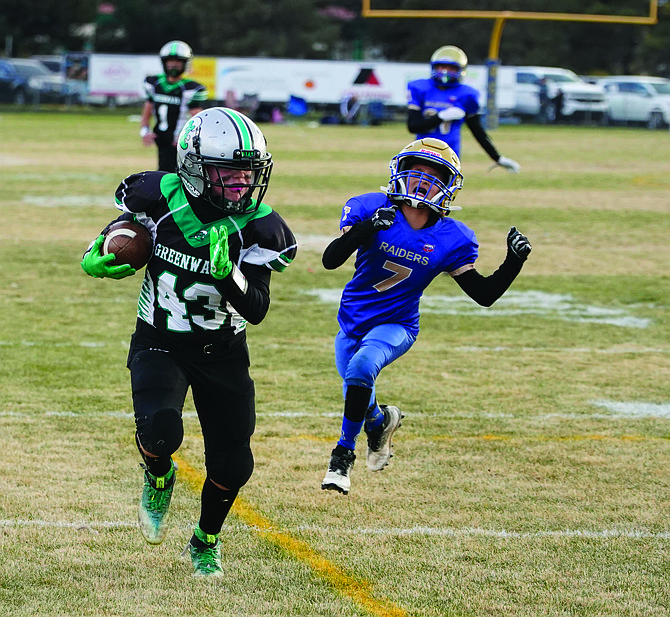 Fallon’s Cooper Gubler runs for a touchdown in last year’s SYFL championship win over Reed in the JV division.