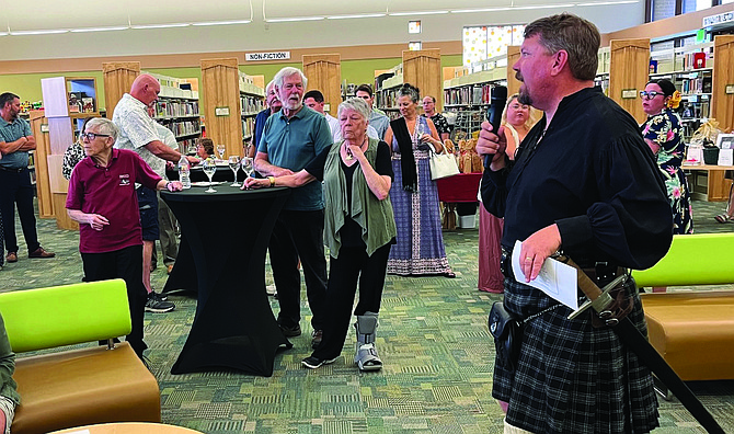 Zip Upham, a member of Churchill Library Association, wears his Scottish tartan at last year’s “Books, Bites and Beverages: A Library Adventure” program. This year’s event is Friday at the Churchill County Library.