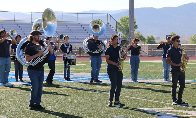 Carson High’s Blue Thunder players, front row, Zachary Carpenter, Sisirely Mata-Bravo and Daniel Limas-Majano perform for district staff members for their welcome back Aug. 10, 2023 at Carson High School.