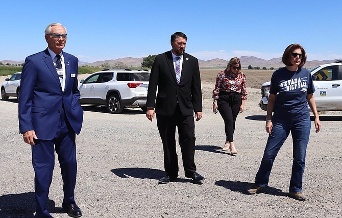 U.S. Sen. Catherine Cortez Masto, right, joins Lyon County Commissioner Dave Hockaday, far left, County Manager Andrew Haskin, center, and emergency manager Taylor Allison on Thursday to view flood damge in Yerington.