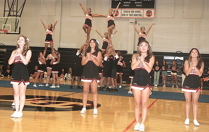 Douglas High School cheer and dance teams welcome students back to school with the”Tiger Beat.”