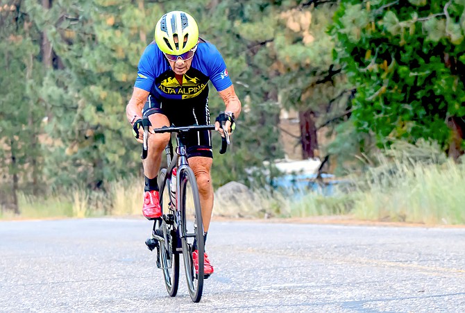 Leon Malmed, 85, sprints for the finish line at the end of the Alta Alpina Cycling Club’s road race in Woodfords, Calif., in early August.