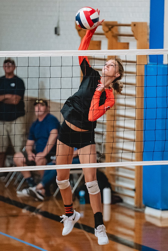 Douglas High’s Suzy Berger goes up for one of her team-leading 26 kills over the weekend at the Yerington volleyball tournament. The Tigers went 6-1 and begin league play this week.