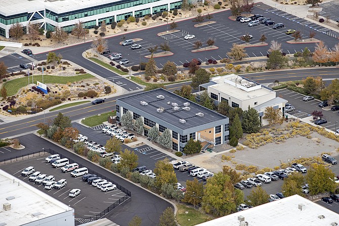 The 15,672 square foot two-story Class A office property on Prototype Drive in Reno is being marketed by CBRE with an asking price of $3.85 million. The building was constructed in 2005.