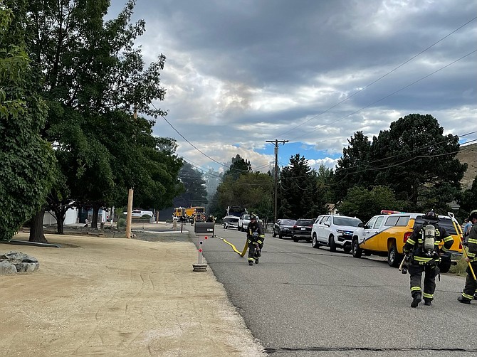 A structure fire was reported at 4:35 p.m. Thursday near Betts Street in south Carson City. The Carson City Fire Department staged on Lennox Street laying hose connected to a nearby fire hydrant as a plume of smoke rose over Washoe Tribe land immediately to the south.