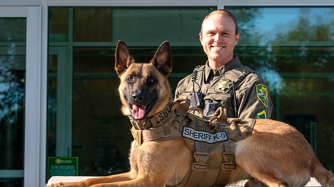 Carson City Sheriff's Deputy Ryan Greb with K-9 Proton in August 2023.