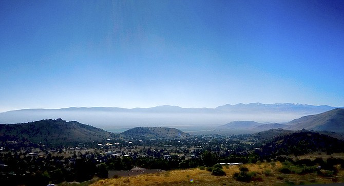 Smoke hangs over Antelope Valley on Thursday morning in Topaz Ranch Estates.