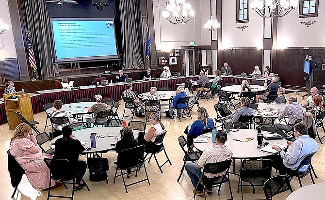 Participants watch a presentation on the Douglas County strategic plan update on Aug. 24 in the CVIC Hall.