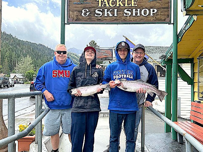Carson City area residents Chad Woods, Zane Woods with a 5.5625-pound catch, Tyler Silsby with a 7.75-pound catch and Kevin Silsby.