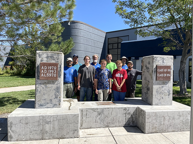 Chandler Ricks, an 11th grader at Sierra Lutheran High School, front row center, and his troop cleaned and repaired the 9/11 memorial at Carson High School.