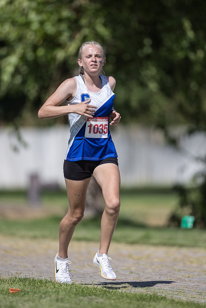 Carson High’s Vea Miner runs during the Douglas Class races at Lampe Park to open the 2023 cross country season. Miner and the Senators were recently invited to one of the biggest cross country meets in the nation this coming weekend.