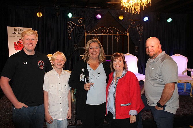 From left, Caden and Kiptyn Martin, Carson Tahoe Chief Nursing Officer Janelle Hoover, Carson City Mayor Lori Bagwell and Greg Hoover at an awards ceremony at Nashville Social Club on Sept. 14, 2023.