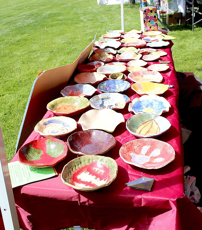 Empty bowls at the Empty Bowls booth at the Just a Drop In Farmers Market back in May.