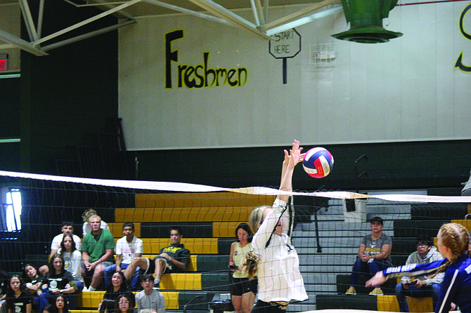 Battle Mountain's Stevlana Martinez goes up for a block against Silver Stage.