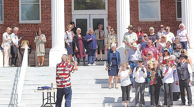 Members of the Daughters of the American Revolution and the Sierra Bell Ringers celebrate Constitution Week with Bells Across America on Sunday.